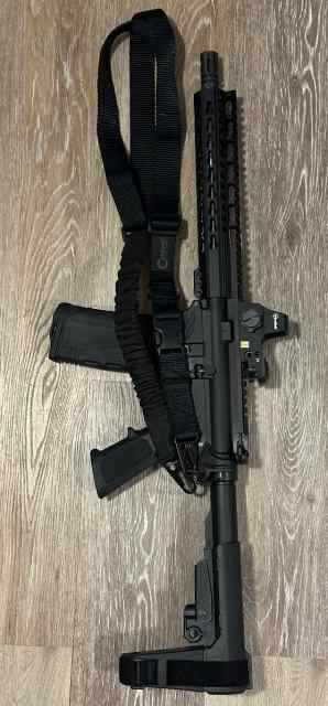 AR-15 PISTOL, SIG P320, AND GLOCK 21SF.