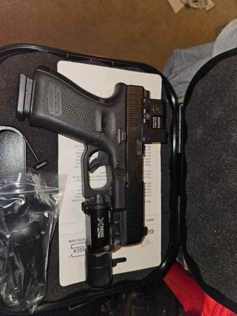 Glock 19 gen 5 with Aimpoint Acro p2 NS surefire